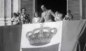 King Umberto II behind of the Flag of Kingdom of Italy