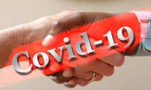covid coronavirus stretta mani