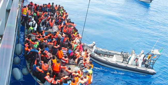 migranti barca mare